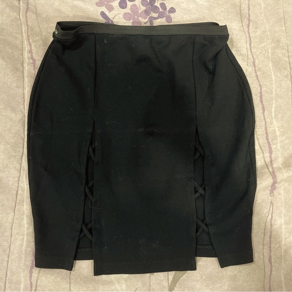 Black mini skirt with cut outs - Picture 1 of 1